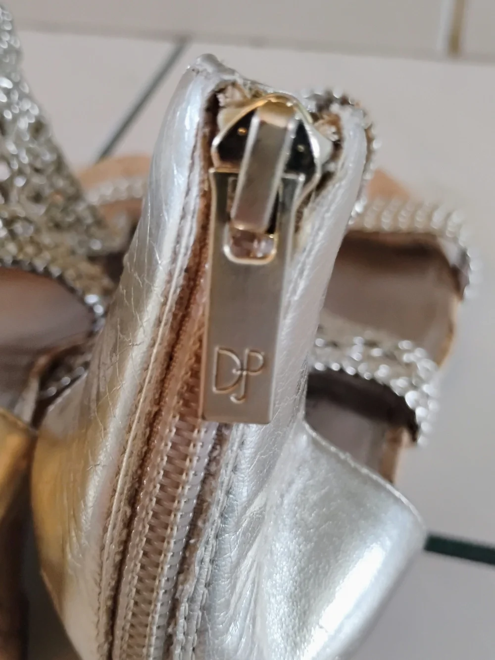 Donald J. Pliner stylish silver